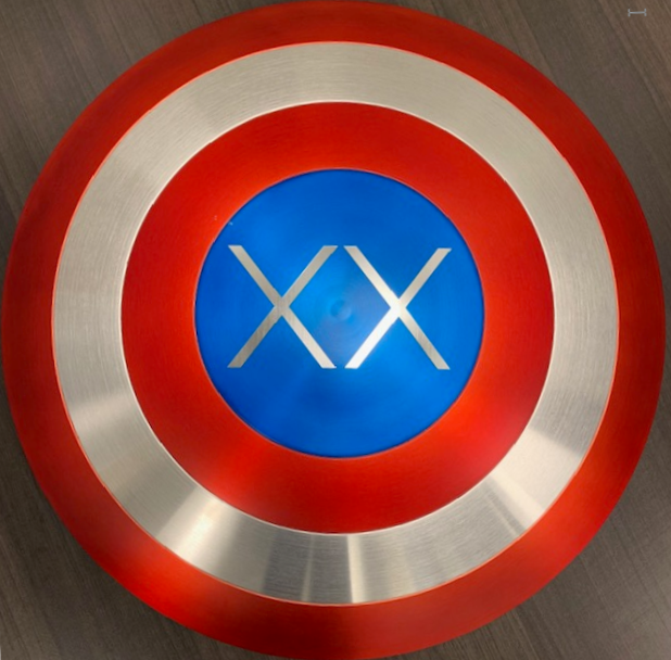 Captain America shield with Plexxis logo